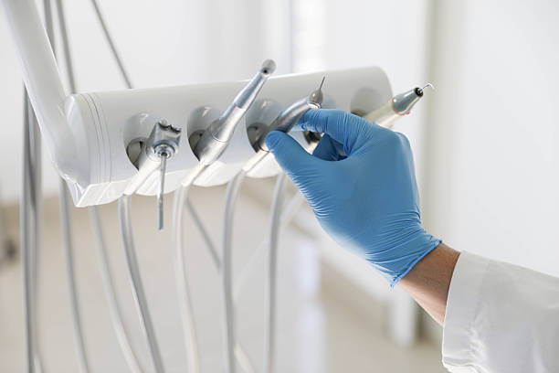 Professional Tooth Extraction technician working in Cleburne County County, AL
